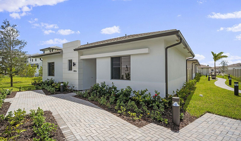 a house with a brick walkway