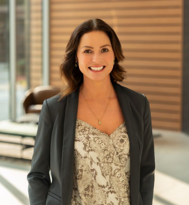 a woman smiling at camera